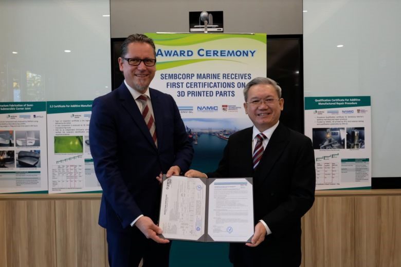 Sembcorp Marine president and CEO Wong Weng Sun (right) receiving the certifications from Mr Remi Eriksen, group president and CEO of DNV GL.
PHOTO: SEMBCORP MARINE
